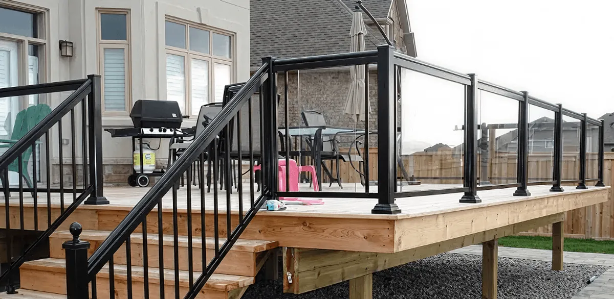 Handrail installation on a deck staircase for safety and code compliance in Mobile, AL