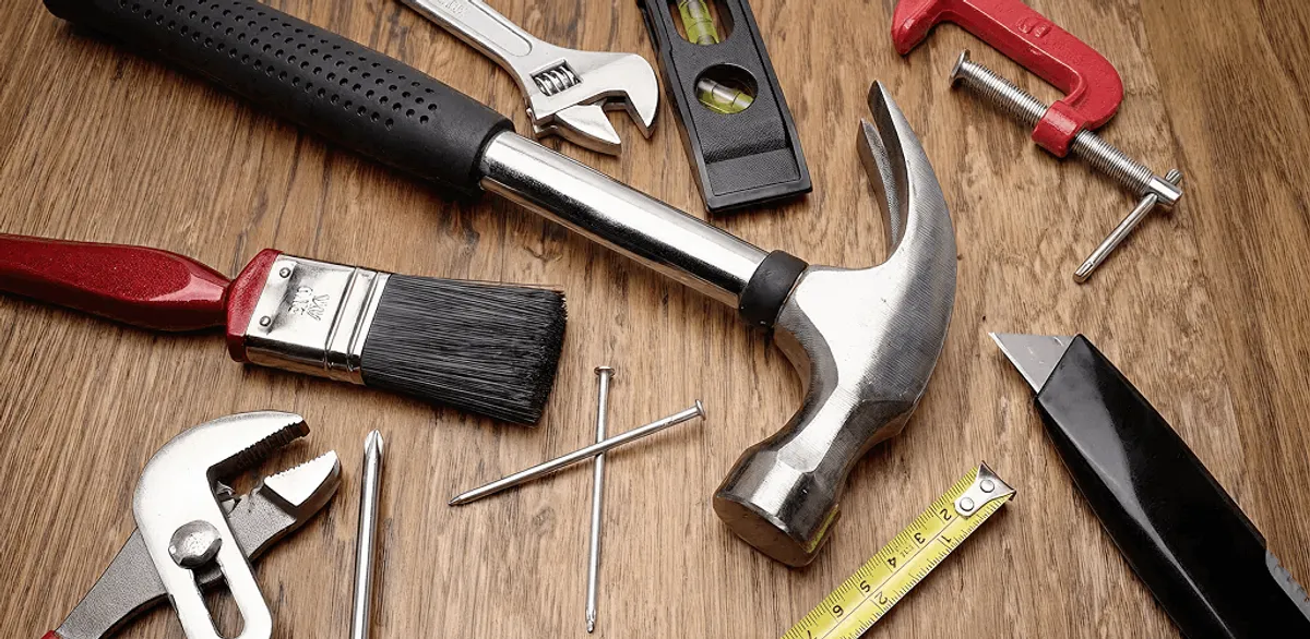 Handyman tools laid out for home repair and maintenance work in Mobile, AL