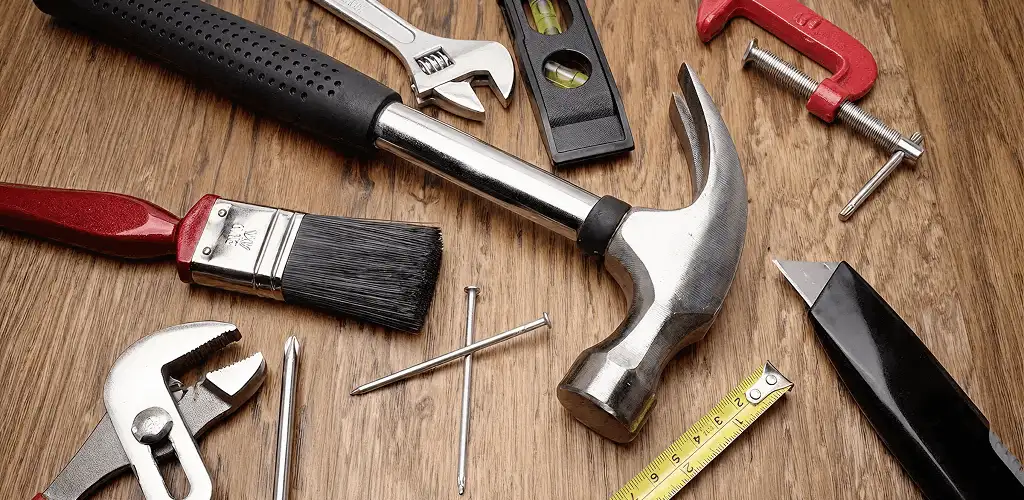 Handyman tools laid out for home repair and maintenance work in Mobile, AL
